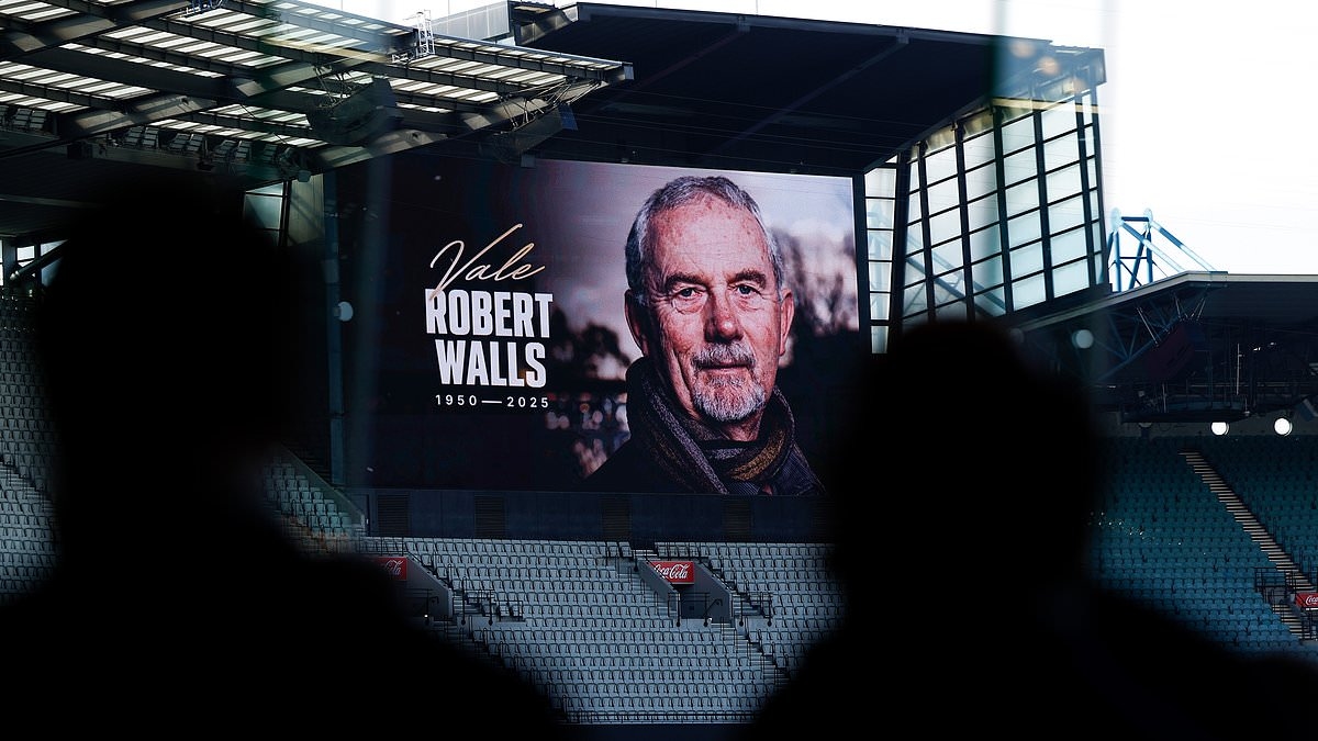 L'icona del football Robert Walls invia un messaggio dall'aldilà che ha scioccato persino la sua stessa famiglia, mentre un'élite dell'AFL lo piange durante la cerimonia funebre.